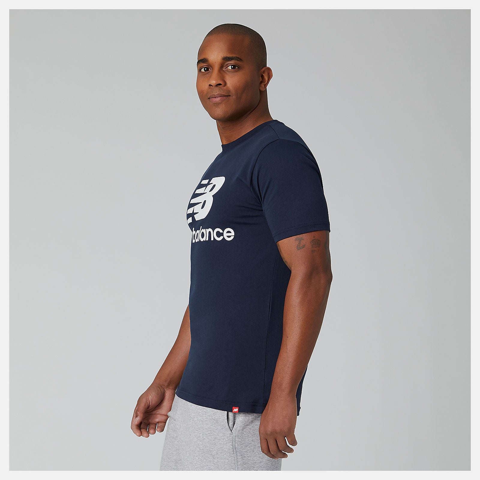 Eclipse Essentials Stacked Logo Tee New Balance Clothing