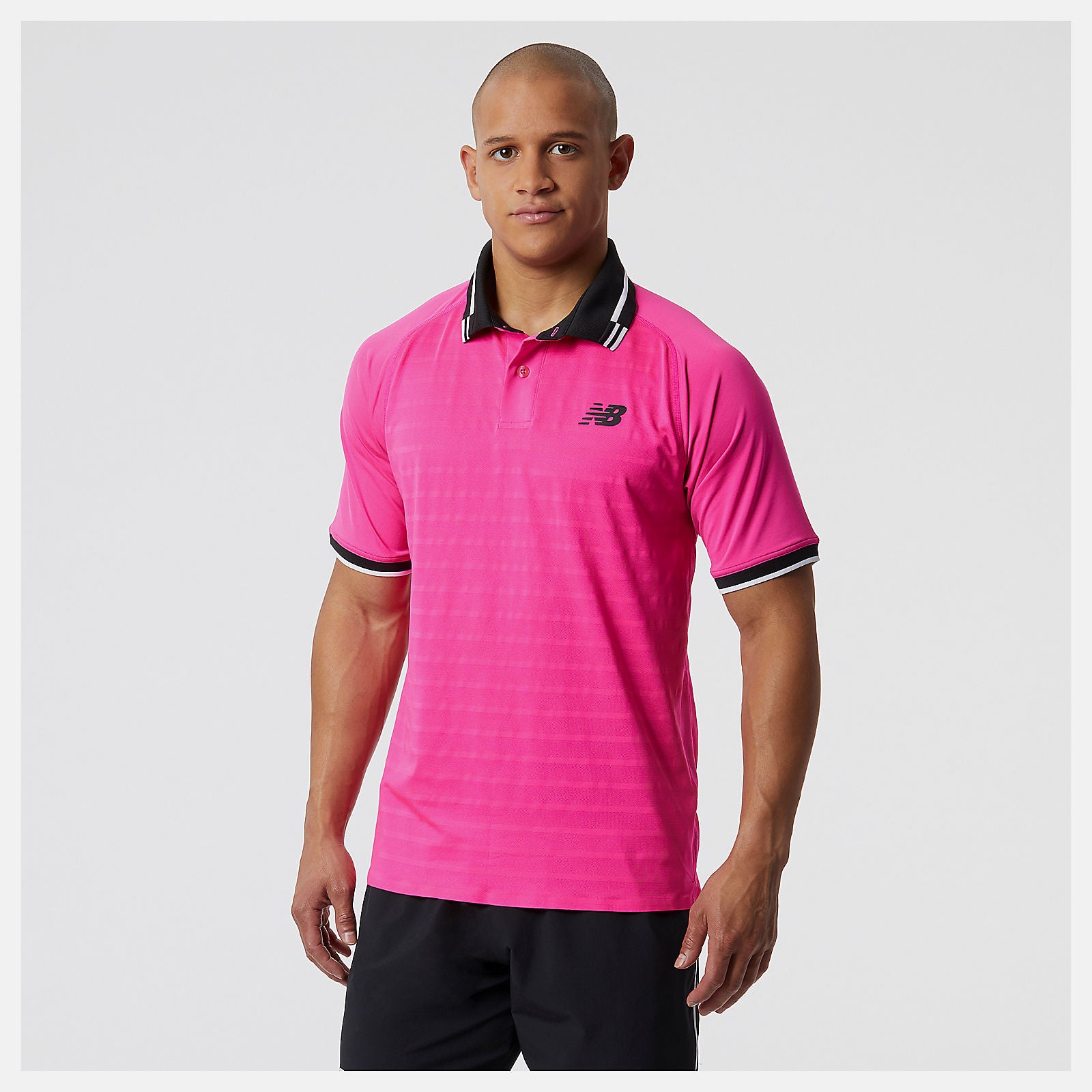 Pink Glo Tournament Polo New Balance Clothing