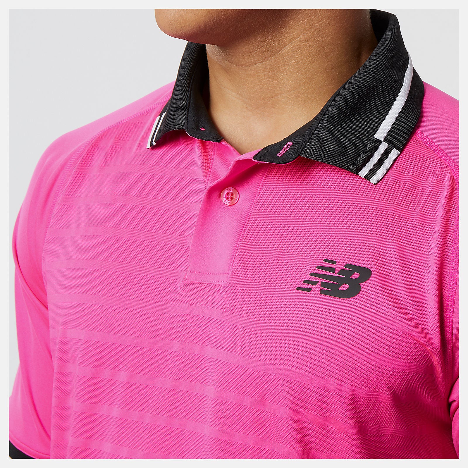 Pink Glo Tournament Polo New Balance Clothing