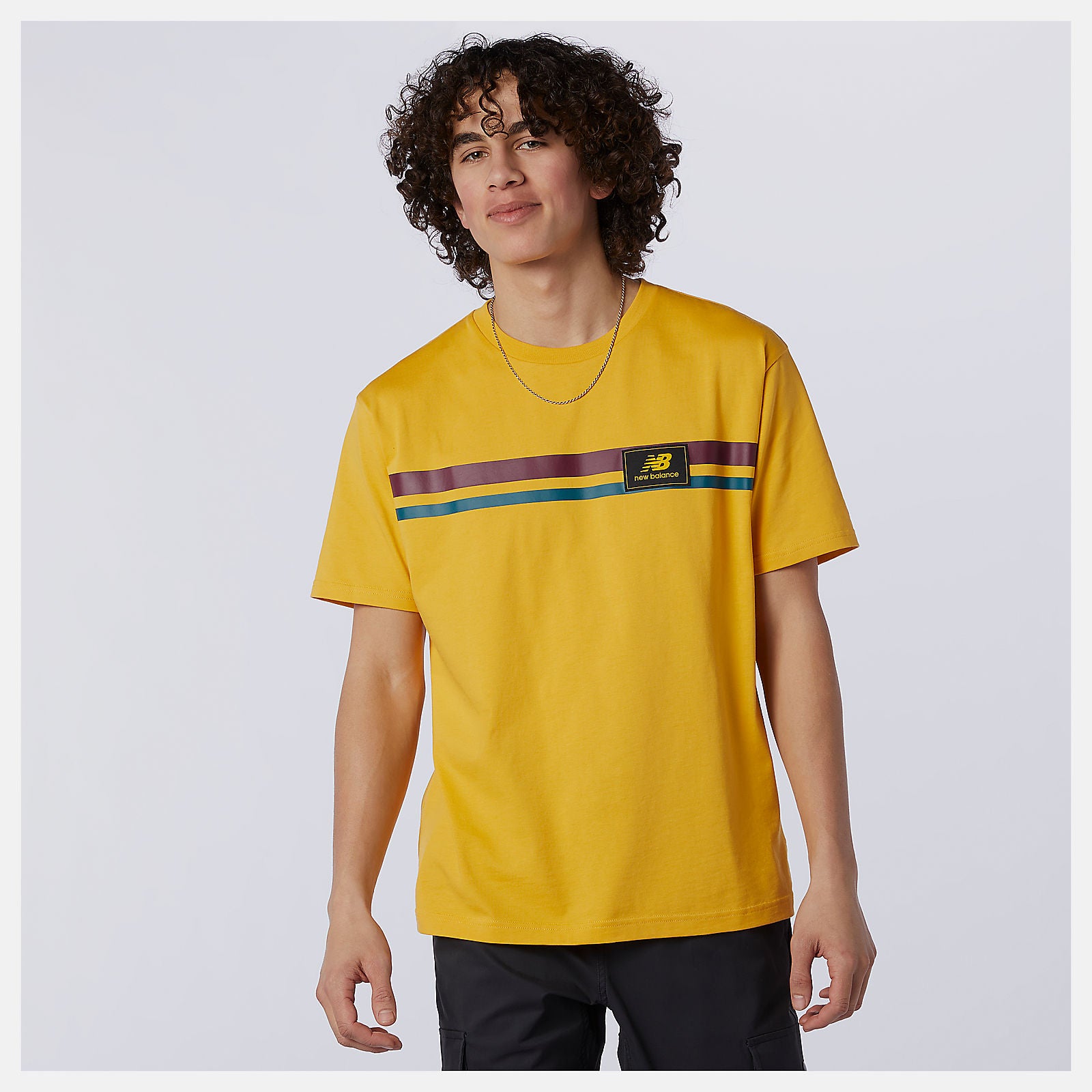 Aspen NB Athletics Higher Learning Badge Tee New Balance Clothing