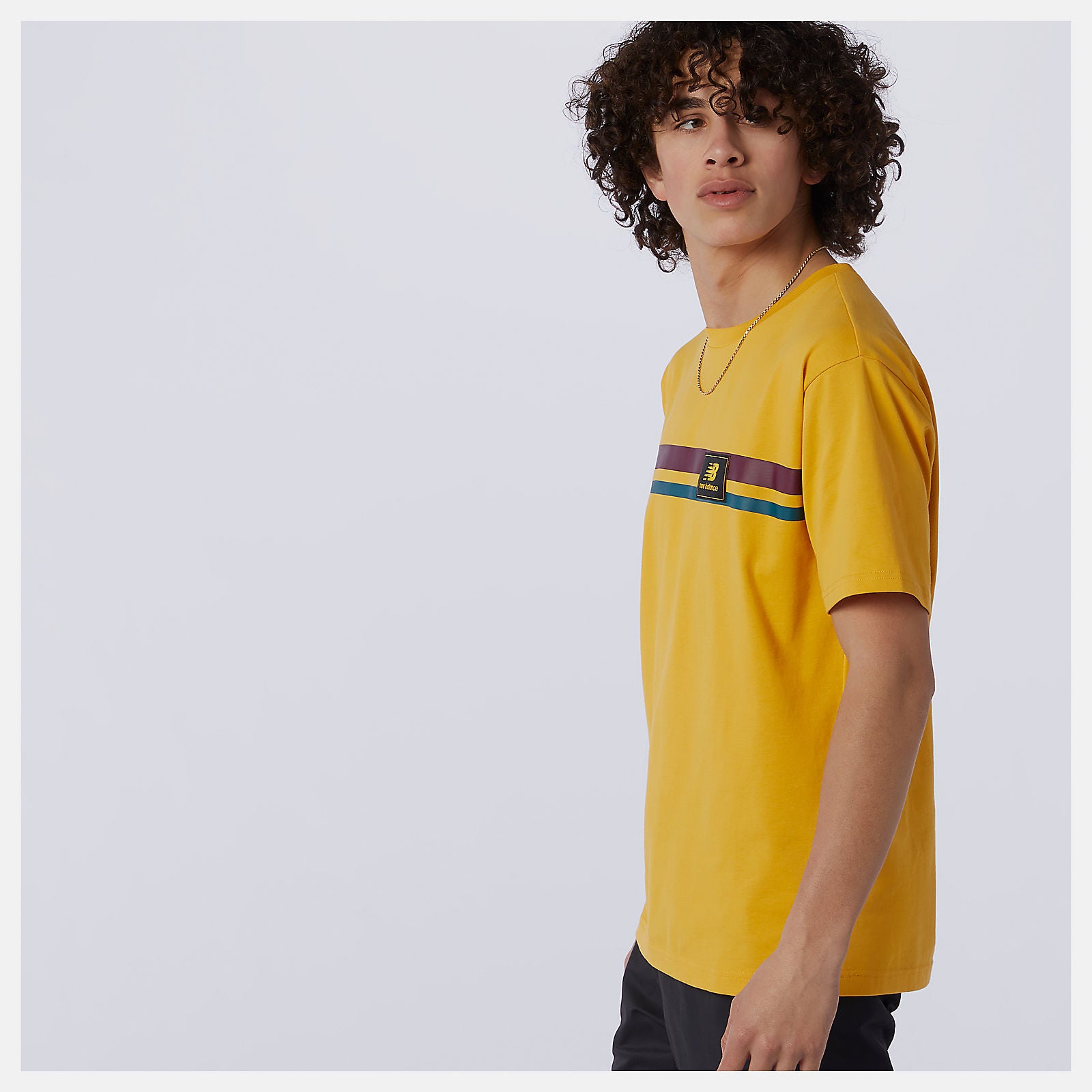 Aspen NB Athletics Higher Learning Badge Tee New Balance Clothing