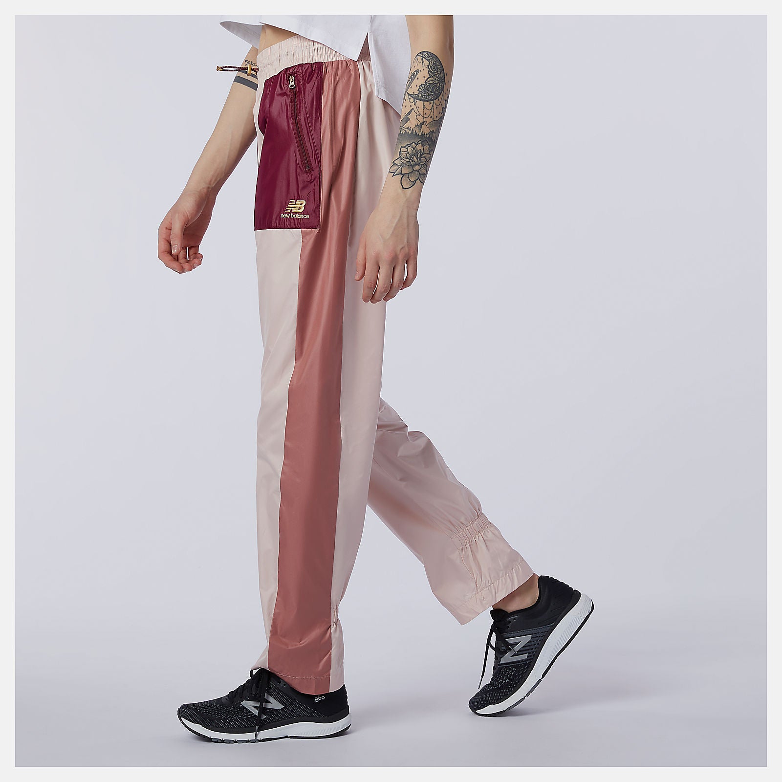 Oyster Pink NB Athletics Higher Learning Wind Pant New Balance Clothing